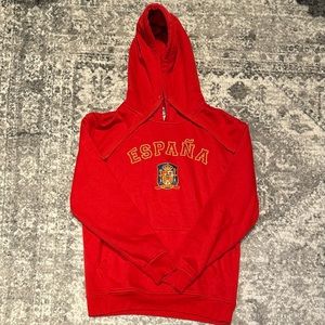 Unisex “España” hoodie from Spain. Size M. Color red.